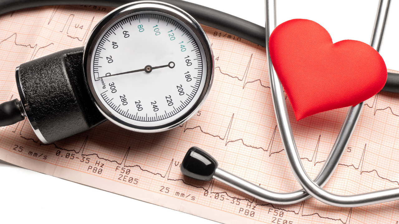 stethoscope on EKG strip with a heart