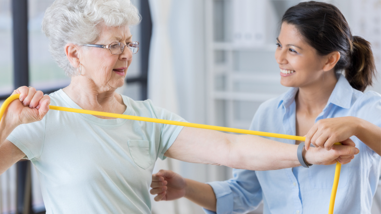 Older woman exercising with bands