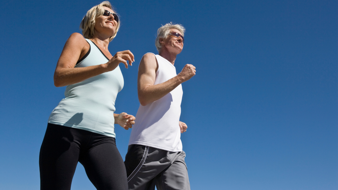 two older adults walking