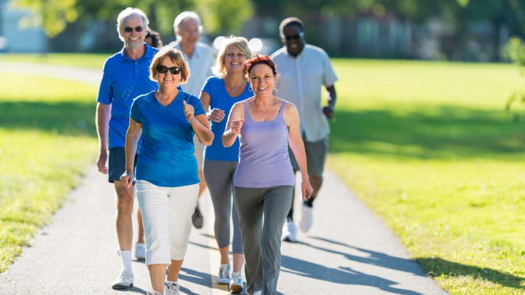 different individuals walking in a park