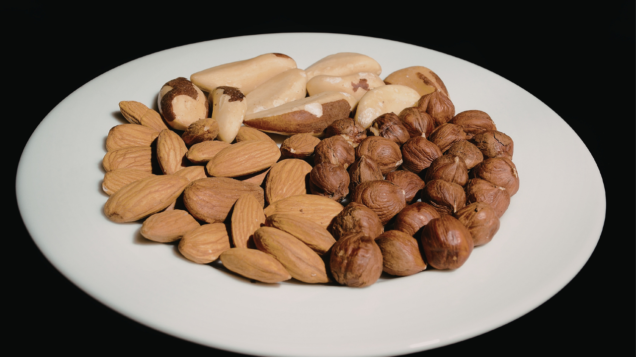 white plate with variety of nuts